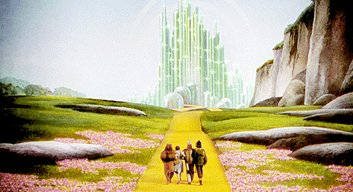 Animated clip from The Wizard of Oz of Dorothy and friends walking the yellow brick road toward the Emerald City
